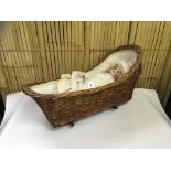 SIMON HALBIG 1078 DOLL WITH SLEEP EYES IN A BASKET CRIB