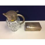 LARGE SILVER DESK CIGARETTE BOX AND LARGE CUT GLASS COOLER JUG WITH PLATED MOUNTS