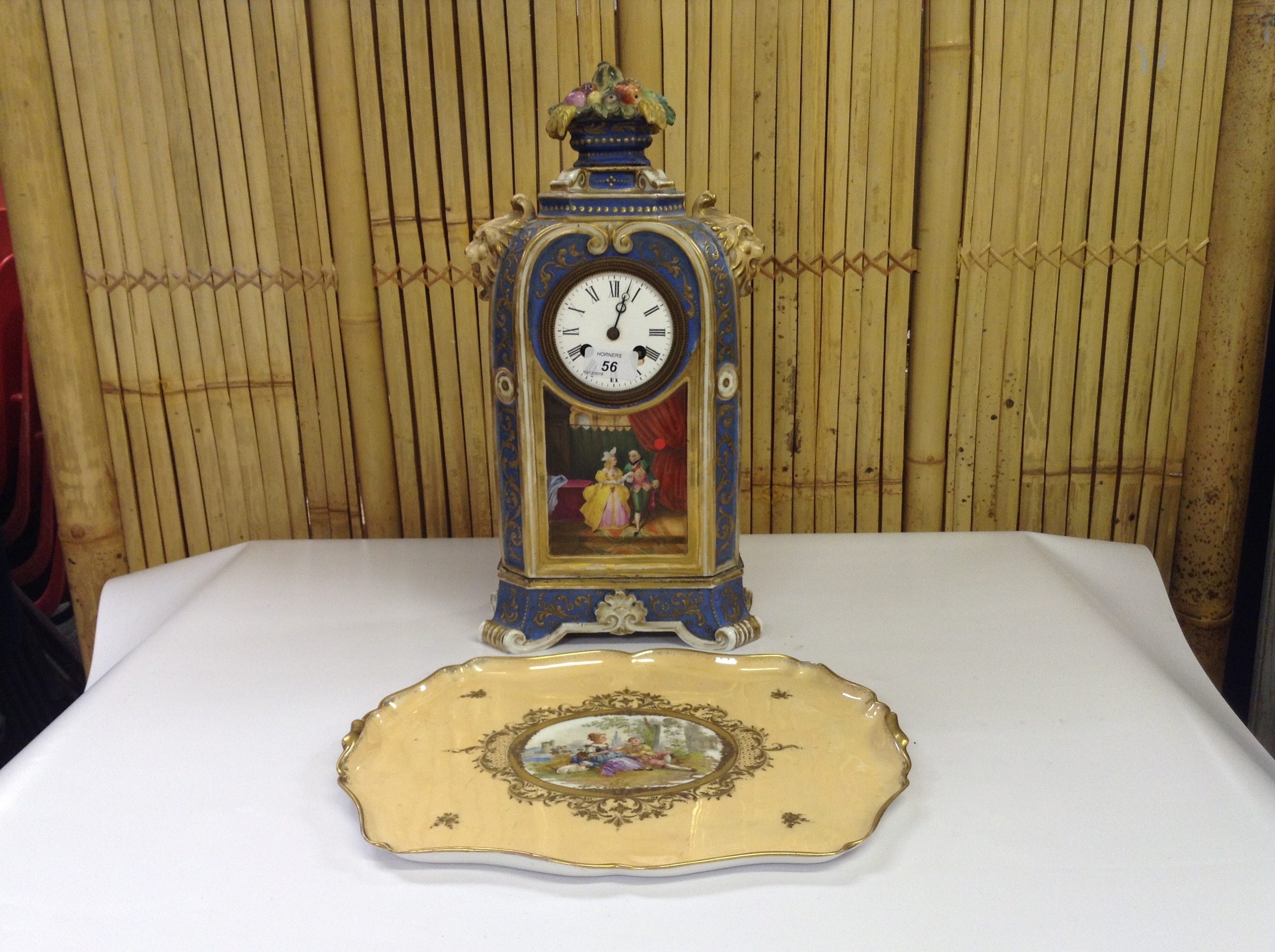 CONTINENTAL CHINA MANTLE CLOCK PAINTED WITH CLASSICAL SCENES ALONG WITH A DRESDEN PORCELAIN TRAY