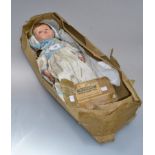 A 1950s composition Wonder Walkie Talkie doll, De-Luxe model, dressed as a nurse, in remains of