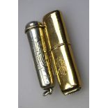 An early 20th century 9ct rose gold push fit petrol lighter, bearing a monogram, probably Birmingham