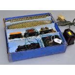 A 1950s cased Hornby '00' EDG7 Tank goods train set, and a Bakelite controller