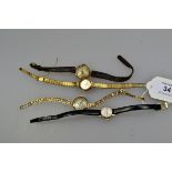 A lady's 9ct gold Roamer wrist watch, together with three further lady's 9ct wrist watches