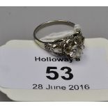 A single stone diamond ring, old brilliant cut diamond in raised claw mount, with pierced and