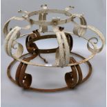 A pair of wrought iron 'Corona' chandelier rings, in the 17th century style, with double scroll