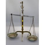 Late 19th century bronze and steel balance scales, with tripod base, 65cm high