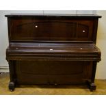 An early 20th century iron framed upright piano