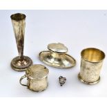 An early 20th century silver capstan inkwell, of oval sections, Birmingham 1914, together with a
