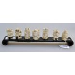 A collection of early 20th century Japanese carved ivory, seven 'household gods' of good luck,