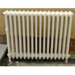 An Edwardian four column sixteen section cast iron radiator, cream painted, 77.5 x 97cm