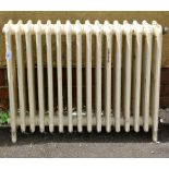 An Edwardian four column sixteen section cast iron radiator, cream painted, 62 x 84cm