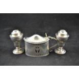 A Goldsmith and Silversmiths Company pierced silver classical style mustard, with blue glass liner,