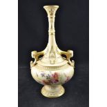 A Royal Worcester blush ivory tall necked vase, painted floral decoration, rams head handles,