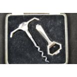 A John Bagshaw cased silver set comprising corkscrew and bottle opener CONDITION REPORT:
