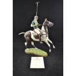 A Bohem porcelain model of 'Polo Player on Pinto' marked to base 55005, no.