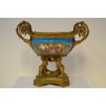 A late 19th century Sevres style gilt metal-mounted turquoise ground oval centrepiece bowl,