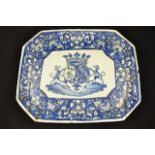 A European, possibly Italian, blue painted armorial platter with foliate decoration to border,