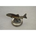 A silvered cold painted bronze figure of a trout on circular plinth - W6cm CONDITION