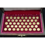 A John Pinches cased set of forty-three 22ct gold coins - 'Kings and Queens of England',