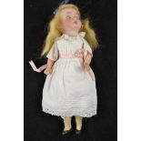 An A J Walther & Sohn bisque headed doll, sleepy brown eyes, open mouth and teeth, blonde wig,