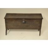 A late 17th century oak plank coffer, original hinges and lock, side compartment to interior,