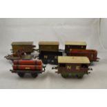 Eight Hornby O gauge goods wagons - LMS banana van (2), Southern Railway goods wagon,