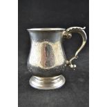 A Victorian engraved silver baluster tankard with scroll handle, London 1861,