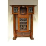 An early 20th century mahogany Arts and Crafts style display cabinet,