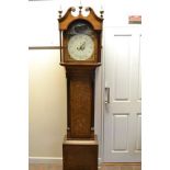 An early 19th Century oak longcase clock, painted arched dial, eight day movement,