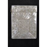 A 19th Century mother of pearl card case, engraved with floral design - 10.3x8cm.