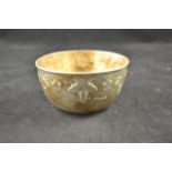 A Walker & Hall silver christening bowl with inscription under base, foliate decoration to exterior,