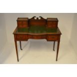 A Maple & Co early 20th century inlaid mahogany writing desk, brass gallery,