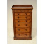 A Victorian mahogany Wellington chest, gallery to top, six graduated drawers with locking stile -
