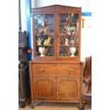 An early 19th century inlaid mahogany secretaire bookcase, architectural pediment, fitted secretaire