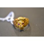 A 22ct gold 'lions head' ring set with ruby eyes, size Z - approx gross weight 18.5g CONDITION