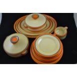 A Clarice Cliff Bizarre orange banded dinner service comprising set of three oval platters - largest