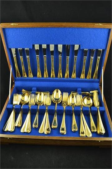 A 'sterling' 24ct gold plated canteen of six place setting cutlery with beaded edge design CONDITION