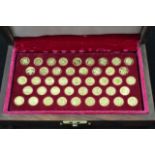 A John Pinches cased set of forty-three 22ct gold coins - 'Kings and Queens of England', CM