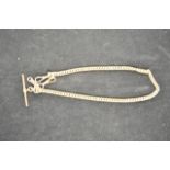 A 9ct gold watch chain with t-bar - length 36cm - approx weight 34.4g CONDITION REPORT good
