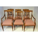 A set of six Edwardian inlaid mahogany dining chairs, including two carvers, with marquetry cross