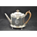 A late Georgian engraved silver teapot with scroll design, wooden handle and knop, London 1796,