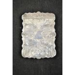 A Victorian engraved silver card case with floral and scroll decoration, Birmingham 1852, maker