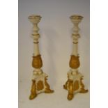 A pair of 20th century composition cream and gilt torcheres with acanthus leaf decoration - H130cm