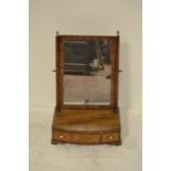 An early 19th century mahogany bow fronted toilet mirror, three drawers to base - W31cm CONDITION