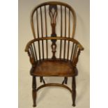 A 19th century ash and elm double hoop Windsor armchair with crinoline stretcher, legs cut down -