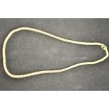 A Thai yellow metal (likely to be high percentage gold) necklace of bead form, length 68cm -