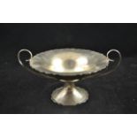 An early 20th century two handled Arts and Crafts style silver bowl, Birmingham 1904, maker M&W -