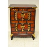 A 20th Century Korean elm chest with brass mounts to cupboards and drawers - H82, W64, D35cm.