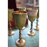 A boxed set of six Eastern European .925 goblets with cherub supports, gilt interiors - H11cm -