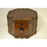 A 20th Century Korean elm octagonal cabinet with black iron mounts - diam 72cm, H50cm. CONDITION